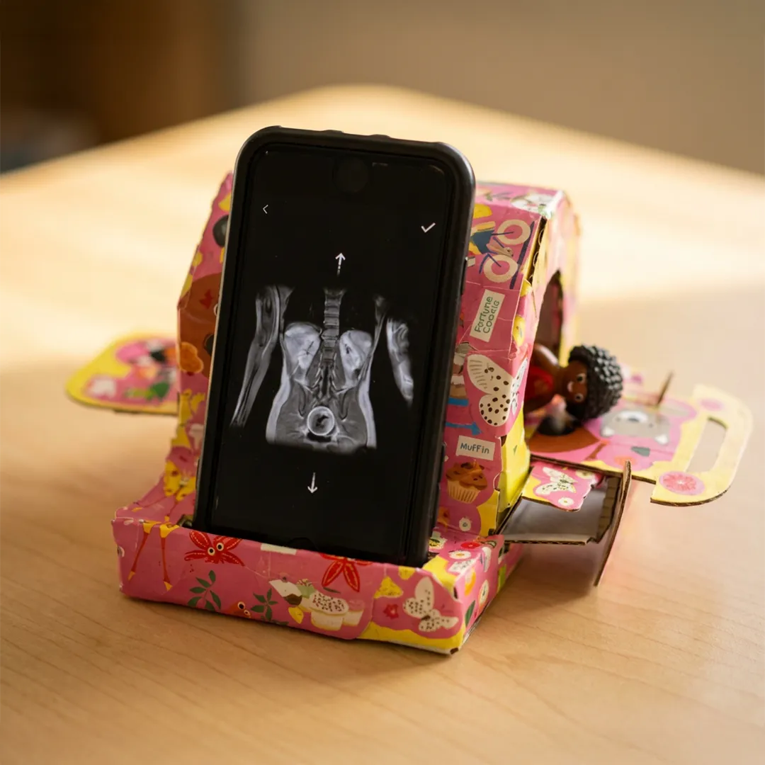 Interactive MRI play kit helping children prepare for MRI scans through hands-on builds and AR elements